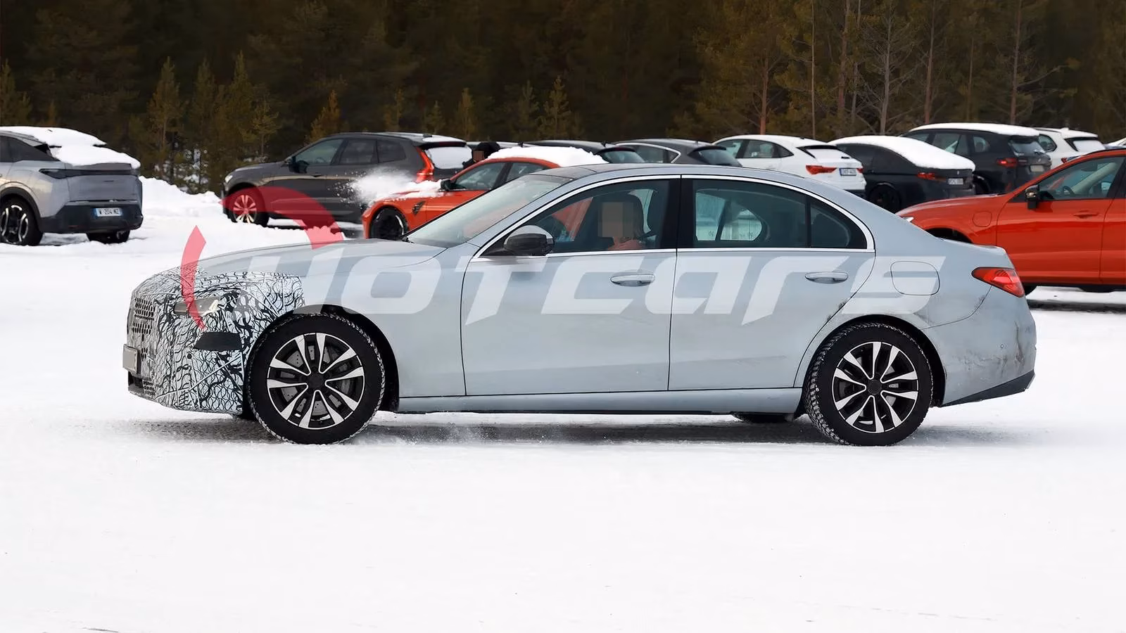 2026-mercedes-benz-c-class-ev-spied-updated-gas-model-here-electric-version-next-image-0